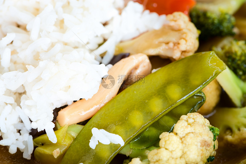 大米和蔬菜的稀饭餐厅食物沙拉营养玉米美食香米粮食盘子胡椒图片