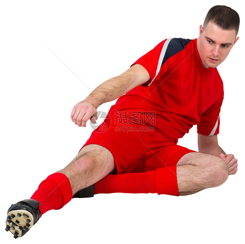 健身足球运动员踢踢和踢球白色播放器齿轮红色运动男性男人活动运动服图片