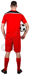 足球运动员握着球播放器男性白色运动齿轮运动服活动红色男人背景图片