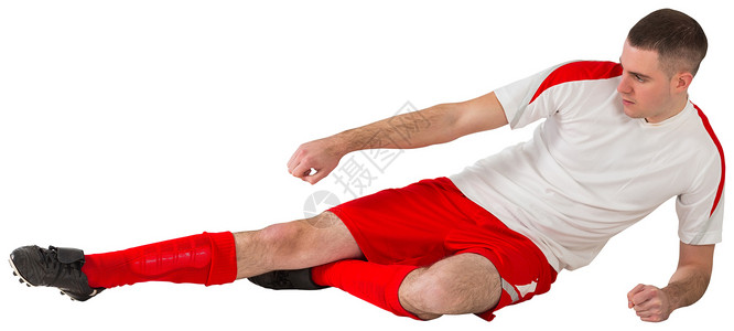 健身足球运动员踢踢和踢球播放器男人齿轮活动白色红色男性运动运动服背景图片