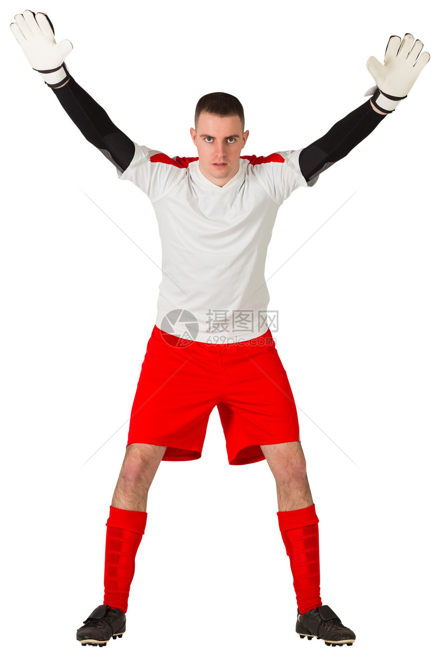 红白的守门员准备接球运动服白色红色足球男性运动活动专注男人齿轮图片