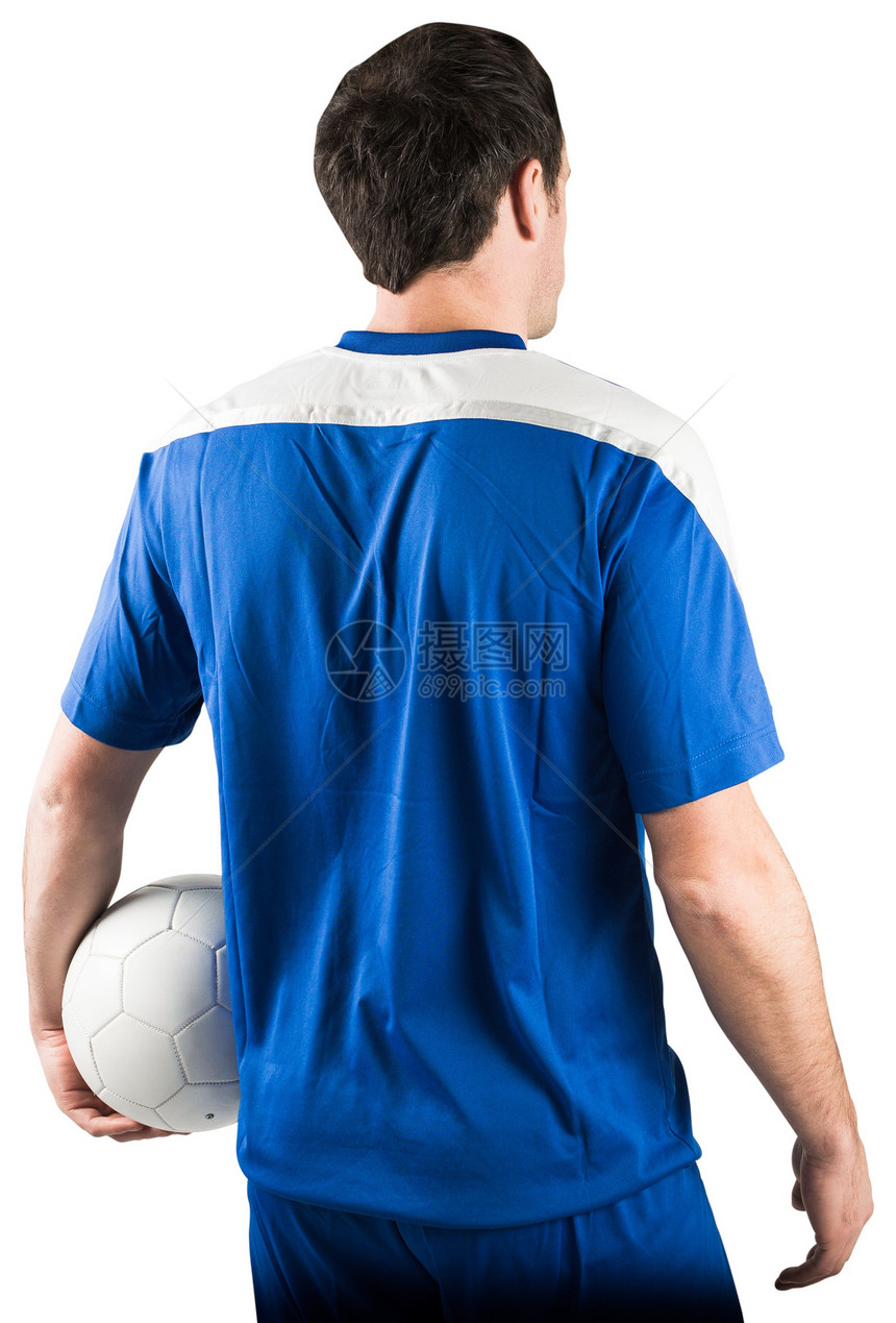 英俊的足球运动员握着球男性齿轮蓝色播放器男人活动运动运动服图片