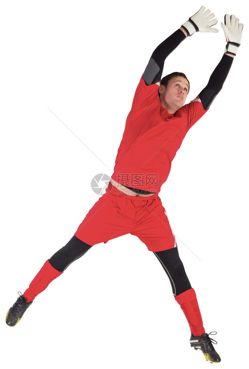 完美目标守门员跳起来运动足球红色跳跃运动服活动男人男性播放器运动员图片