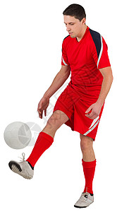 年轻足球运动员踢球男人齿轮男性运动服红色播放器活动运动背景图片