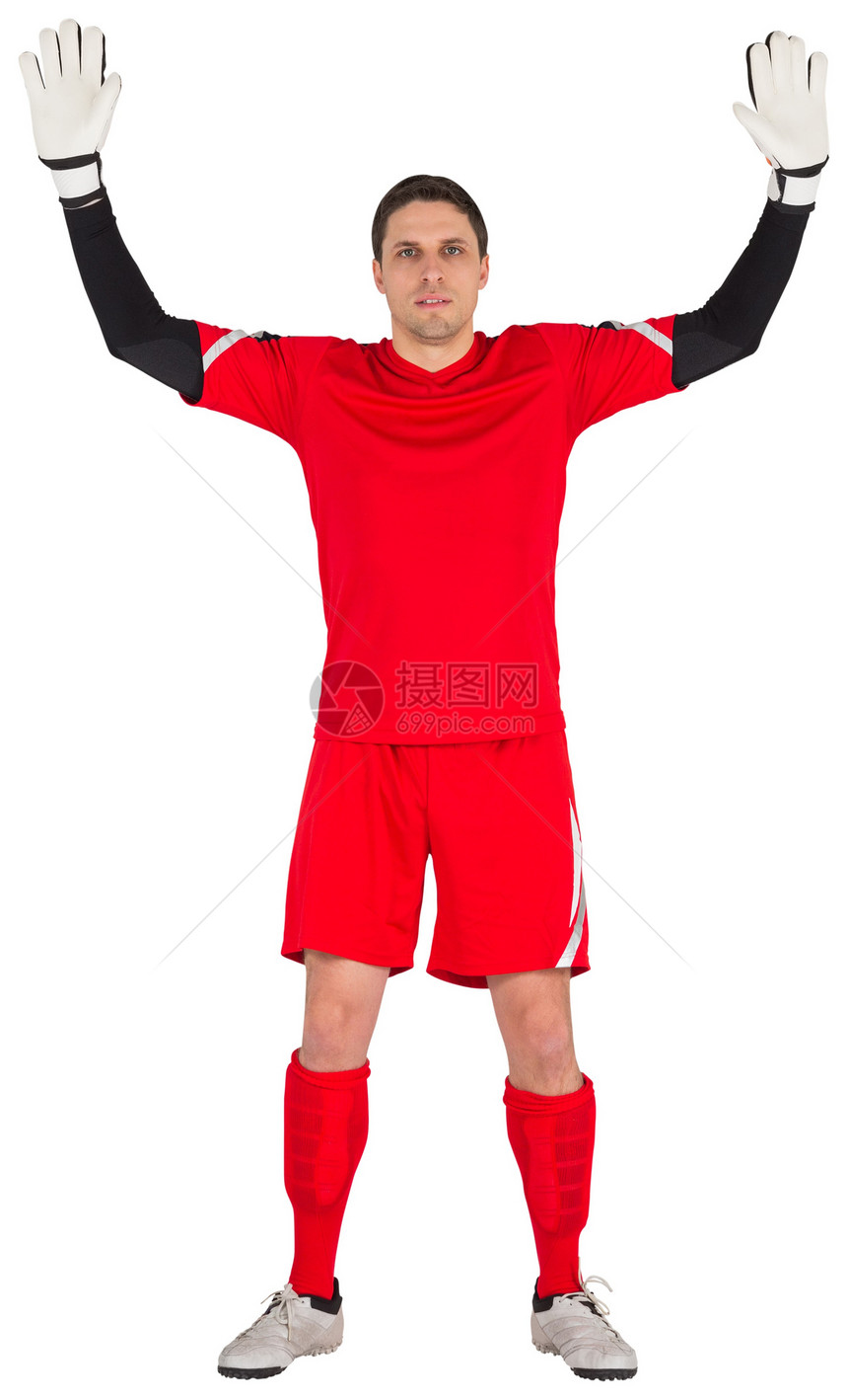 目标守门员看镜头运动员男人齿轮足球红色播放器运动活动运动服男性图片