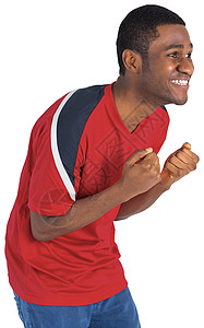 红欢呼的足球球迷兴奋活力男人世界球衣快乐红色运动欢呼支持者微笑背景图片