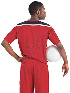 穿红球衣的英俊足球运动员男性黑色齿轮播放器运动运动服男人活动背景图片