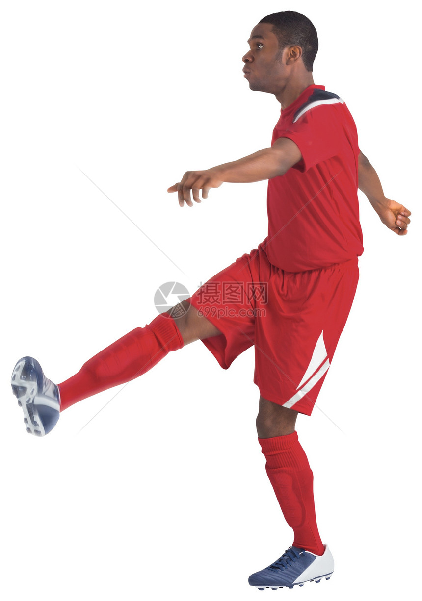 红脚踢足球运动员黑色运动服齿轮男人男性播放器运动活动图片