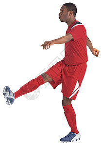 红脚踢足球运动员黑色运动服齿轮男人男性播放器运动活动背景图片