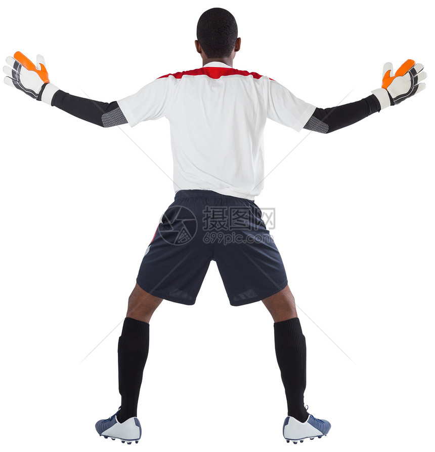 白色的守门员准备拯救足球姿态男性运动服齿轮运动播放器黑色运动员男人图片