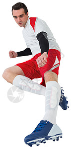踢白脚足球运动员齿轮运动服男人男性播放器运动活动背景图片