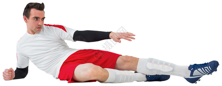 踢白脚足球运动员播放器男人运动服齿轮活动男性运动背景图片