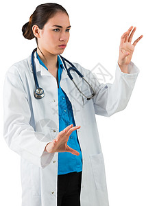 年轻医生举起手站立背景图片