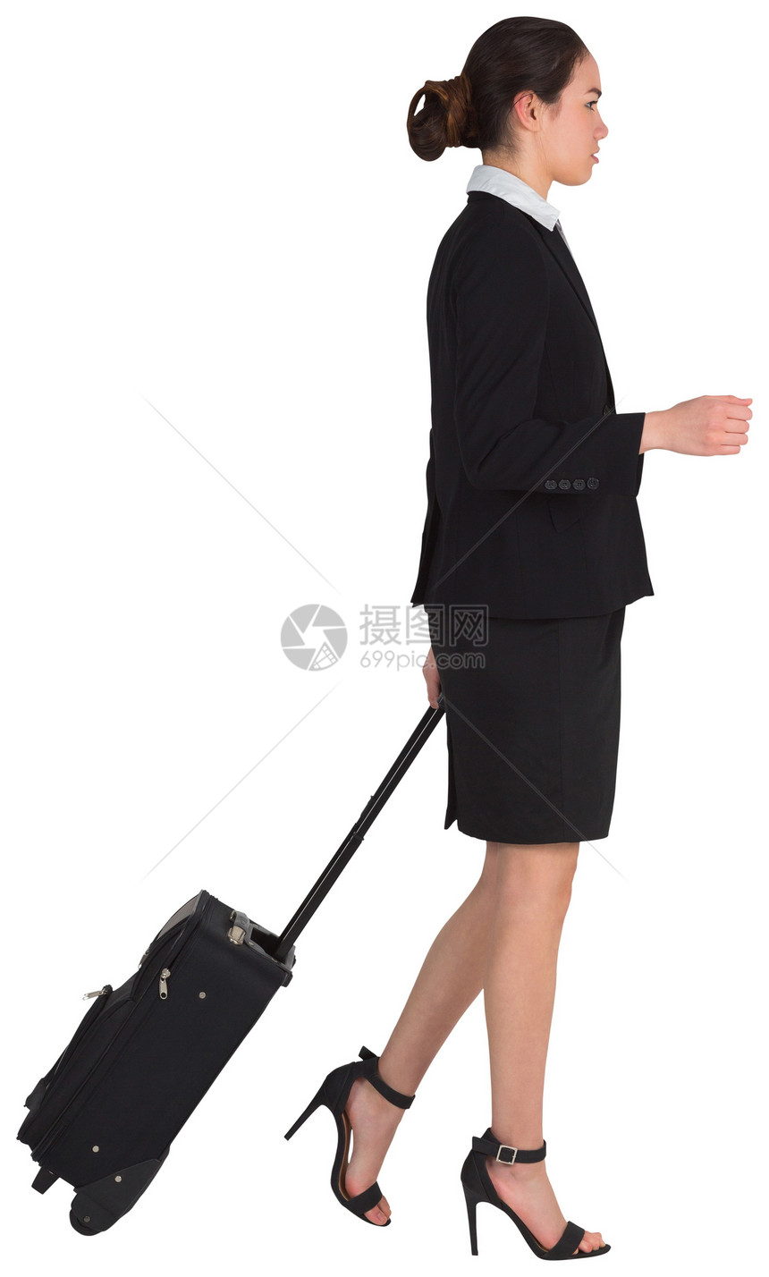 女商务人士拉她的行李箱商业游客公司混血商务旅行人士职业手提箱女性图片