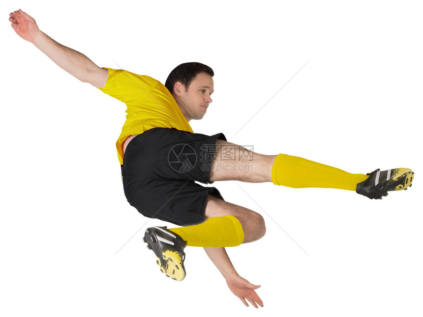 黄色脚踢足球运动员播放器男性跳跃运动服齿轮运动男人活动图片
