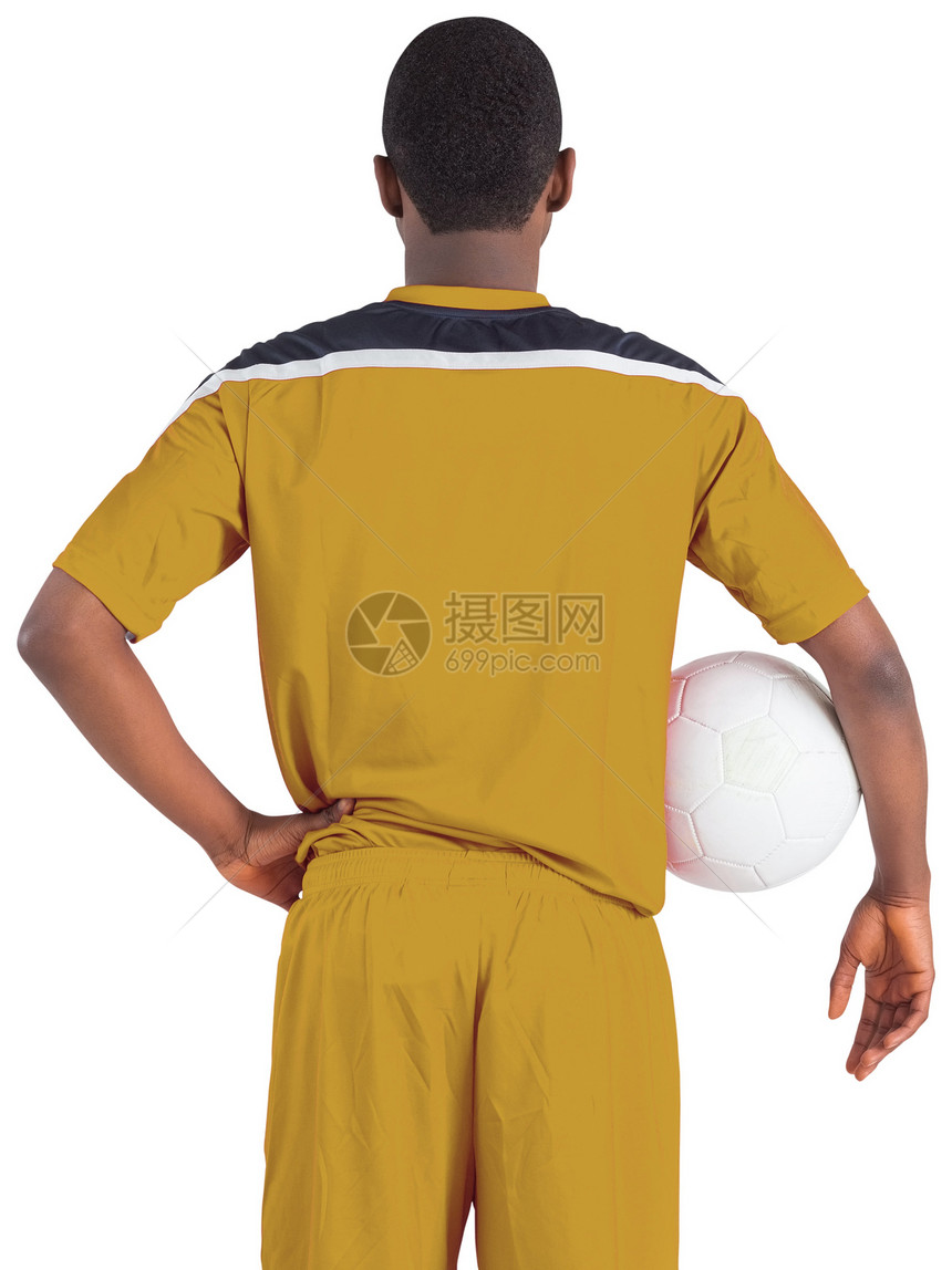 足球运动员在黄色握球中男性黑色活动播放器运动服齿轮运动男人图片
