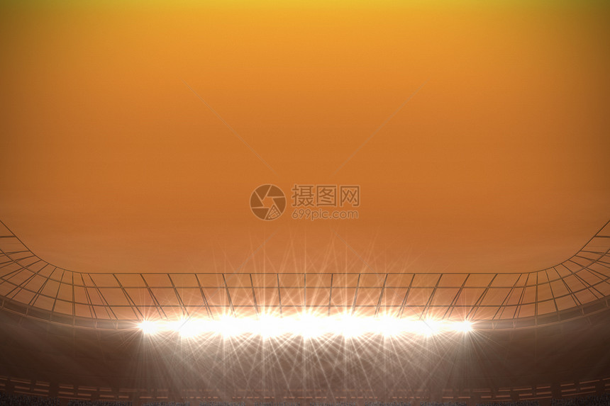 橙色天空下大型足球场图片