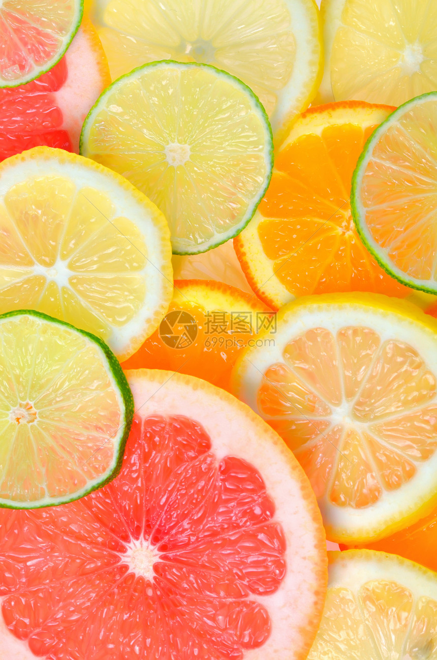 切片柑橘类水果背景粉色种子红色黄色热带柠檬绿色橙子肉质食物图片