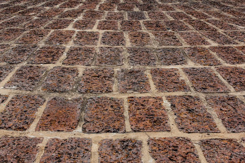古老的红地 平坦的田地马赛克铺路地板建造路面半圆材料接缝正方形风格图片