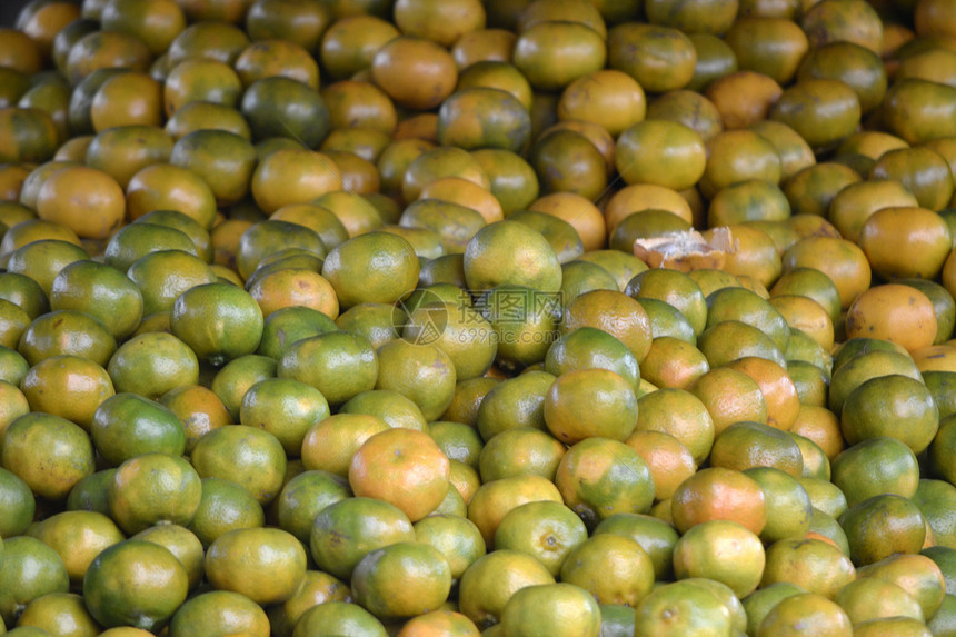 一堆橙色黄色营养热带绿色食物水果农业图片