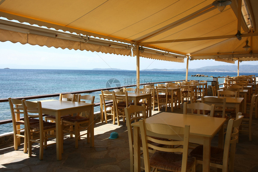 餐馆海景旅行旅游桌子椅子蓝色黄色餐饮图片