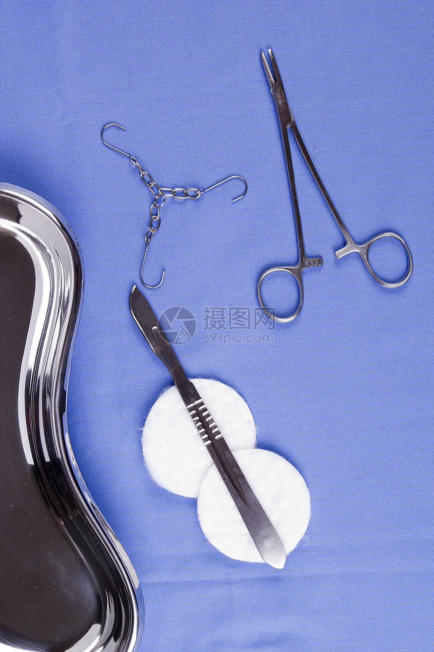 专业外科手术器械医师治疗夹子仪器药品切口桌子蓝色工具手术刀图片