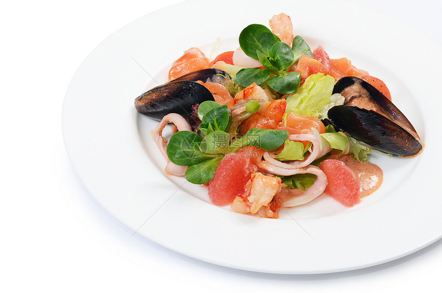 海鲜和鲑鱼的沙拉美味营养刀具食谱鱼片熟食盘子食物烹饪餐厅图片