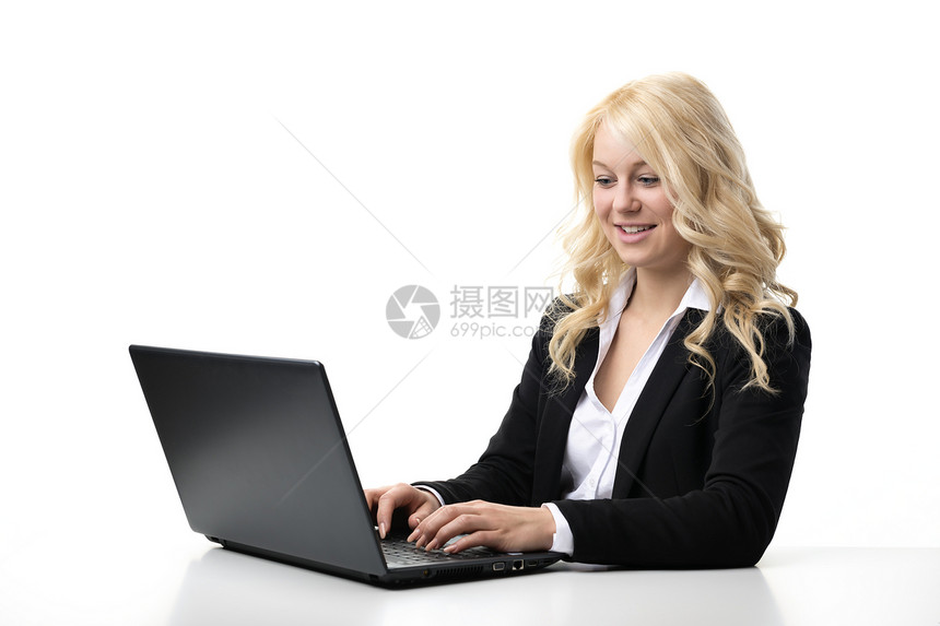 在笔记本电脑上工作的妇女女孩经理秘书老板套装桌子会计互联网学习人士图片