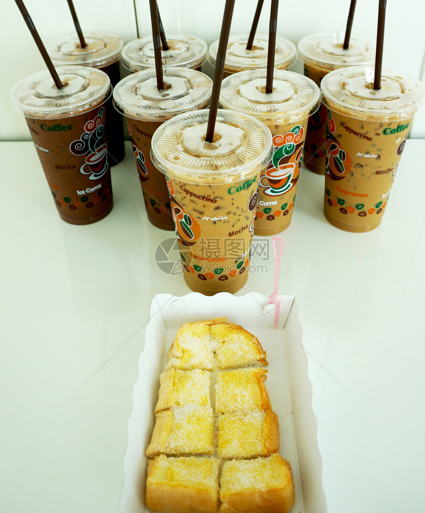 咖啡休息时间棕色液体咖啡店饮料黄油面包小吃甜点办公室杯子图片