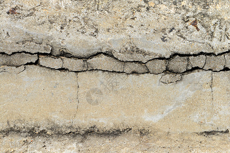 混凝土纹理剪接背景粉碎磨损材料灰色石头水泥裂缝地面高清图片