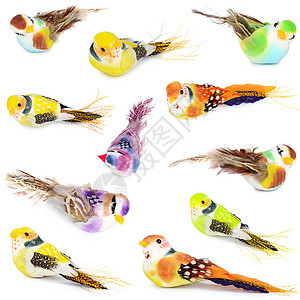 白色背景孤立的玩具鸟热带异国黄色尾巴动物古董宏观艺术翅膀绿色背景图片