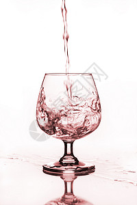 含水的葡萄酒杯酒杯茶点餐厅派对杯子飞溅气泡运动酒吧水晶背景图片