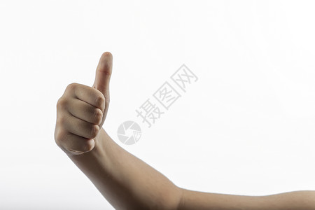 年轻手做搭便车的动作无名指空手手势孩子男生拇指拳头信号胳膊指头背景图片