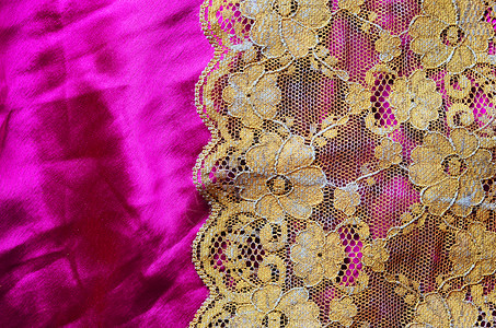 蕾丝紫色材料丝绸布料织物奢华边界花朵金子纺织品背景图片
