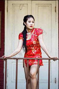 中华女子在传统的中国青桑祝福下保佑服装女士微笑裙子女孩文化女性新娘戏服背景图片