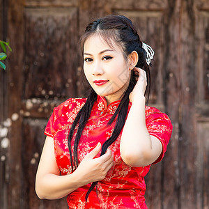 中华女子在传统的中国青桑祝福下幸福服装微笑新娘文化女孩问候语保佑戏服女性背景图片