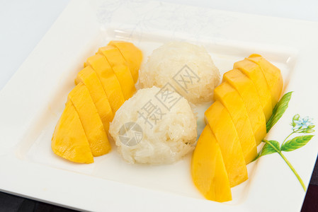 加鲜芒果的甜糊米面椰子牛奶奶油叶子食物热带营养美食午餐坚果水果甜点背景