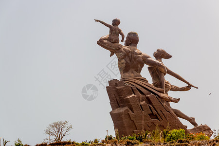 非洲文艺复兴纪念碑雕像爬坡女士孩子青铜艺术男人纪念碑背景图片