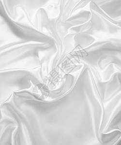 平滑优雅的白色丝绸银色涟漪织物投标海浪材料布料曲线纺织品折痕背景图片