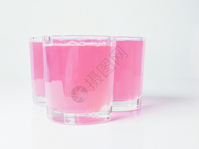粉红葡萄果汁玻璃水果酒吧酒店早餐天堂眼镜西柚汁葡萄柚红色背景图片