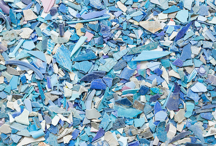 蓝色粒子颗粒塑料树脂颗粒背景橡皮仓库垃圾工厂碎屑摄影化学制造业化学品粒子背景