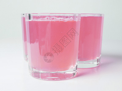 粉红葡萄果汁眼镜西柚汁水果红色葡萄柚天堂早餐酒店酒吧玻璃背景图片