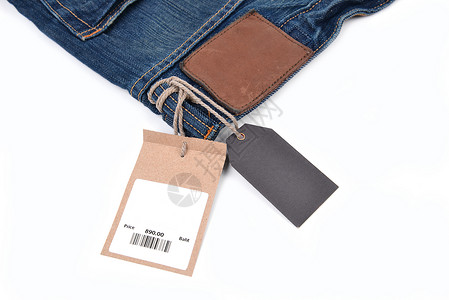 条码标签带有牛仔牛仔裤条码的价格标签织物空白材料牛仔布棉布服装裤子购物销售商业背景