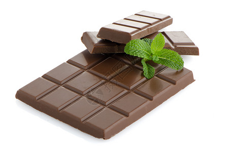 巧克力的封闭细节小吃黑色可可薄荷甜点营养白色美食诱惑棕色背景图片