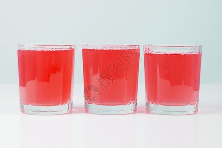 粉红葡萄果汁眼镜红色西柚汁玻璃酒店葡萄柚早餐天堂酒吧水果背景图片