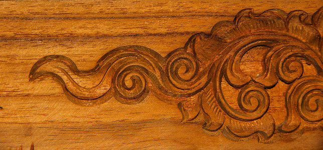 木雕工艺控制板木工棕色风格家具雕塑装饰木头艺术背景图片