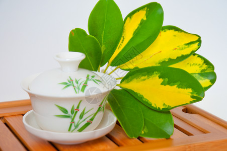 茶桌子木头保健厨房植物卫生食物药品茶壶杯子背景图片