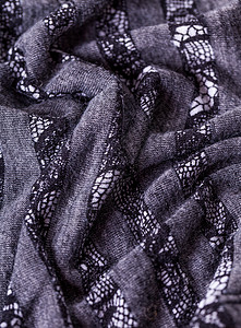 特写灰色松银线衣服折叠缝纫奢华服装编织材料条纹装饰褶皱背景图片