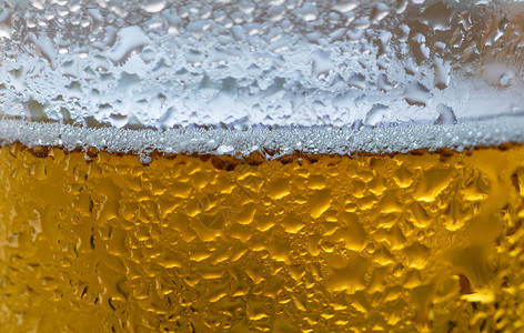啤酒酒精黄色气泡食物酒吧灯光运动苏打气体泡沫背景图片
