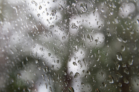 镜子上的水滴雨滴玻璃天气窗户反射液体背景图片